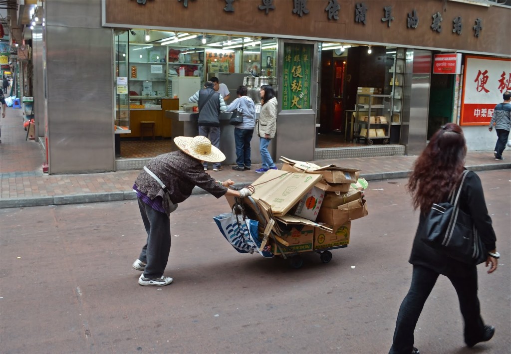 old-ladies-pushing-recyclables-in-hong-kong