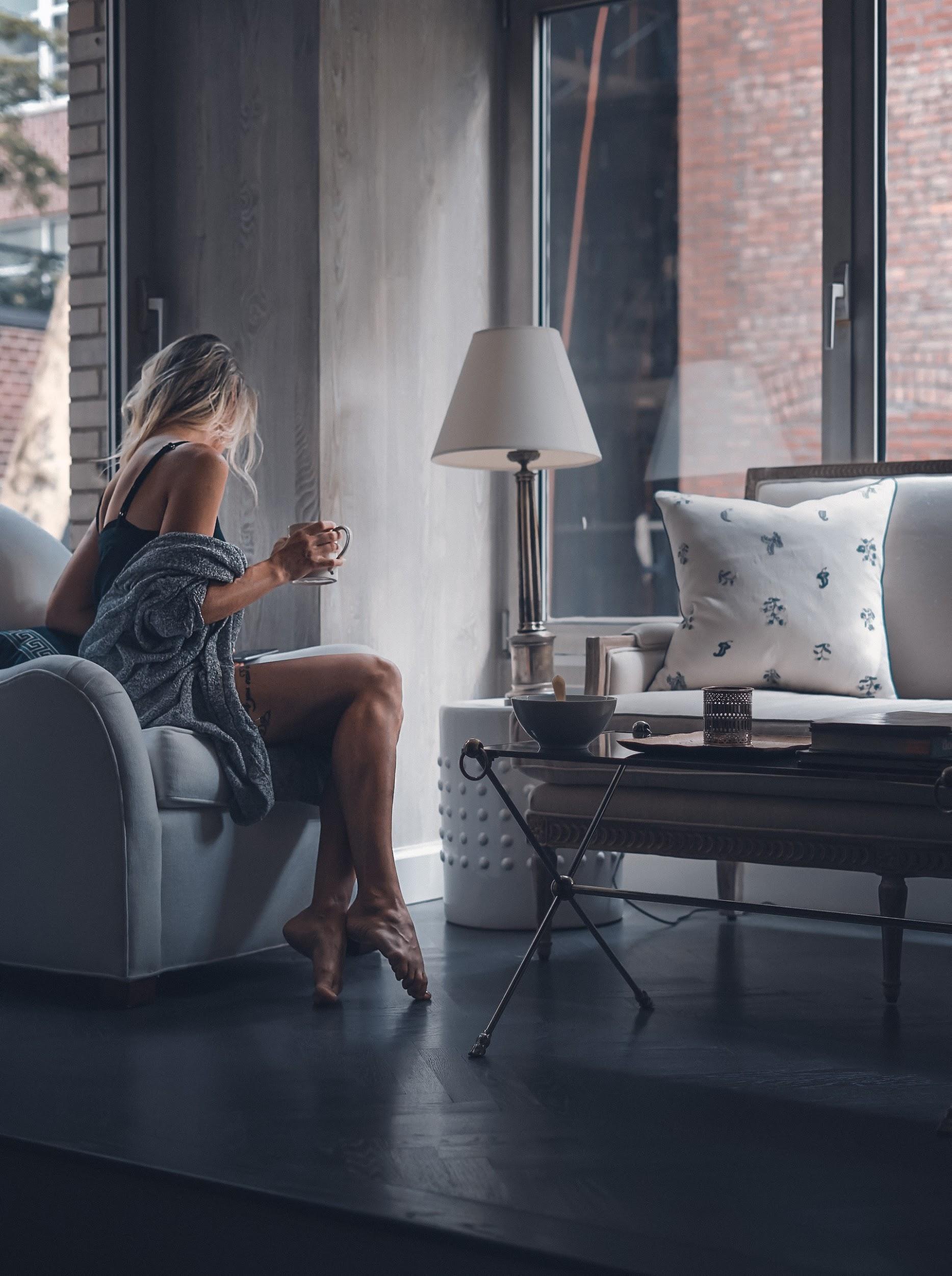 woman-sitting-on-sofa